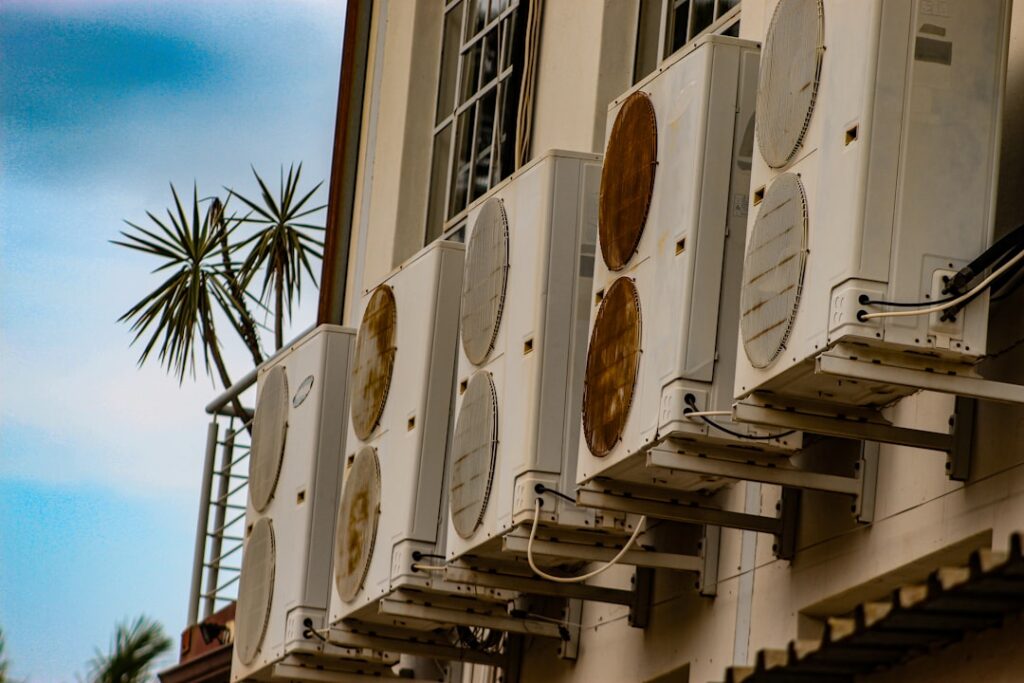 High SEER Ratings Might Just Be Your Cold Hard Cash's Best Friend 6 high efficiency air conditioner unit outside modern home - is a higher seer rating worth the extra cost